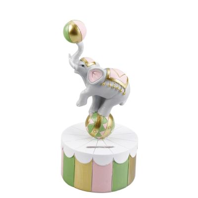 SALVADANAIO Elefante giocoliere celeste in resina 17 cm BOMBONIERA